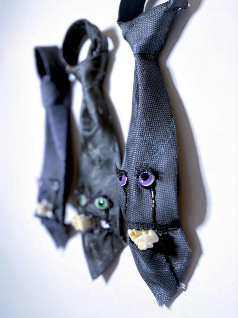 【The Weeping Ties】 2023 Vintage necktie, popcorn, resin, stone clay, acrylic paint, false eyelashes, wire, wooden board, spray, paint Taken separately Rin Northwind リン ノースウィンド