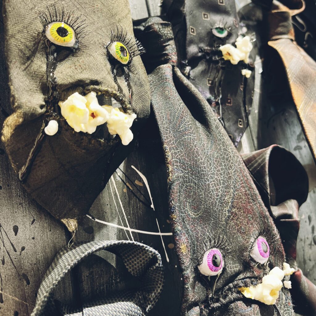 【The Weeping Ties】 2023 Vintage necktie, popcorn, resin, stone clay, acrylic paint, false eyelashes, wire, wooden board, spray, paint Detail2 Rin Northwind リン ノースウィンド