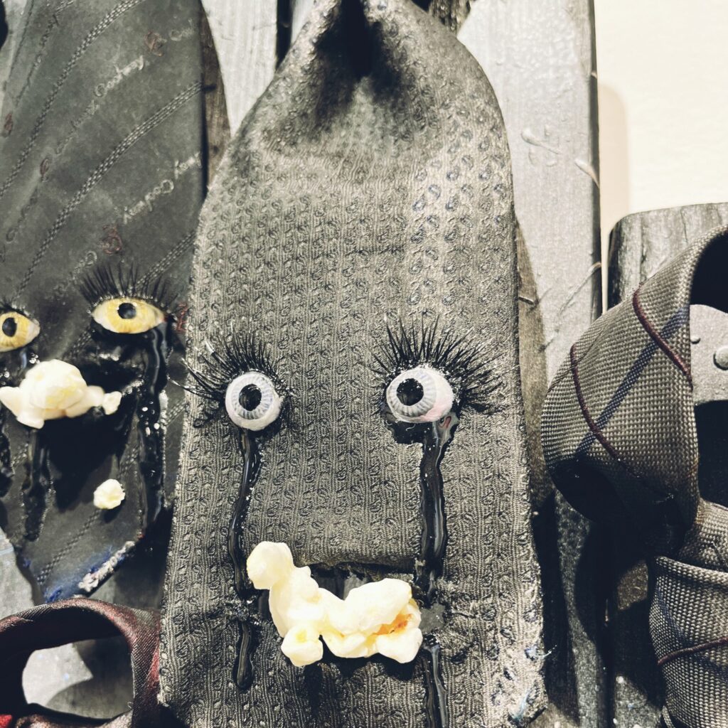【The Weeping Ties】 2023 Vintage necktie, popcorn, resin, stone clay, acrylic paint, false eyelashes, wire, wooden board, spray, paint Detail4 Rin Northwind リン ノースウィンド