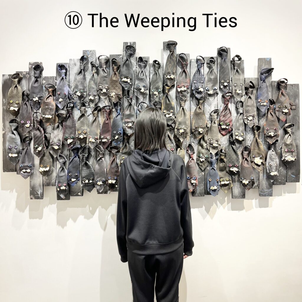 【The Weeping Ties】 2023 Vintage necktie, popcorn, resin, stone clay, acrylic paint, false eyelashes, wire, wooden board, spray, paint With artist Rin Northwind リン ノースウィンド