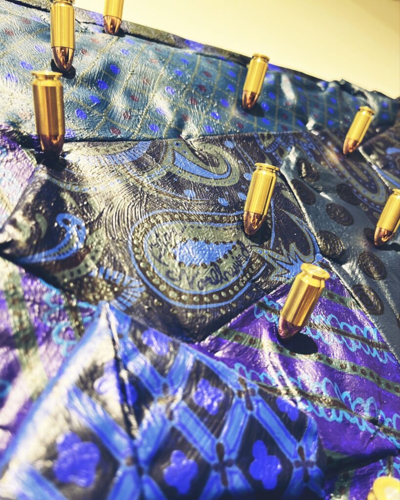 【The humanism starry night】
2023
Handmade necktie, canvas, live ammunition, acrylic paint, clear spray
Detail3
Rin Northwind