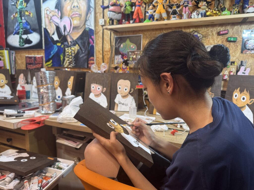 【1000 Uneqi by ChatGPT×RIN NORTHWIND】#001~#046/1000 2025 A4 oil-stained wooden panel, oil paint, urethane varnish, BB pellets, other materials H297mm W210mm D25mm 
Work in progress
Rin Northwind